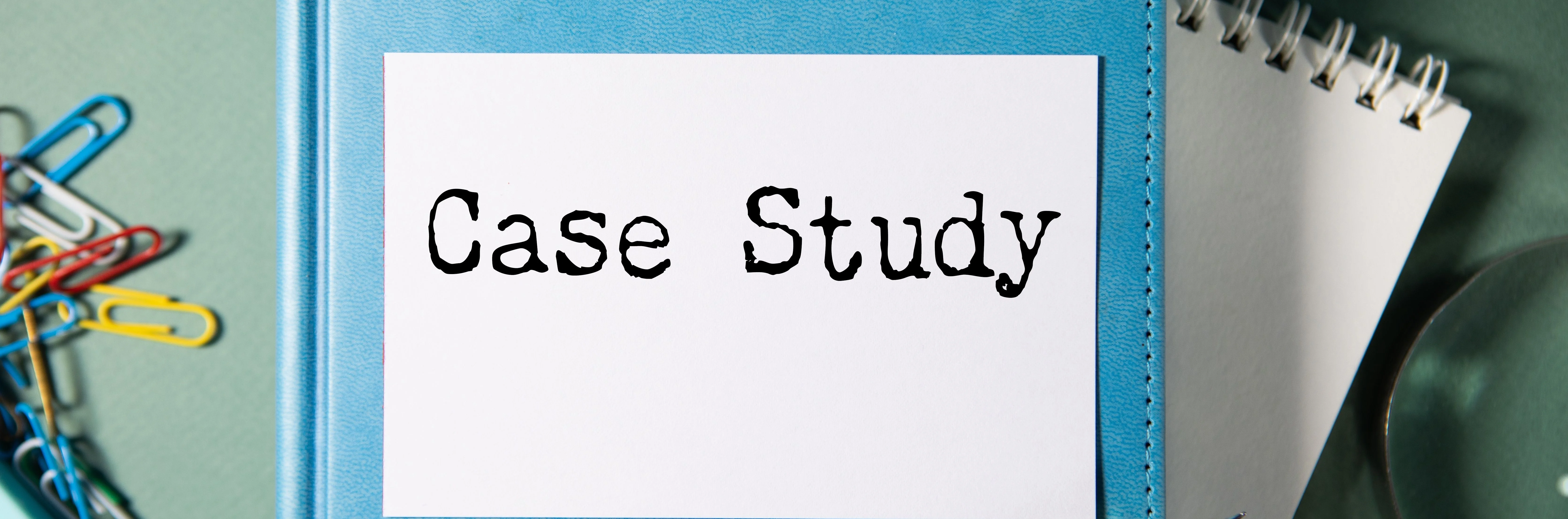 blue notebook labelled “case study”