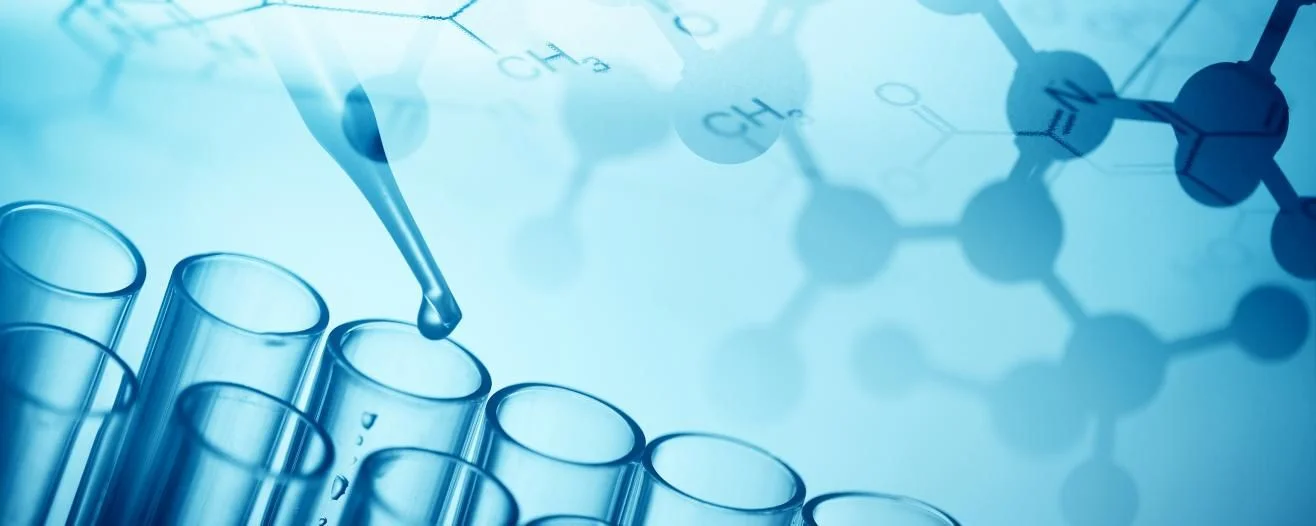 A pipette is dispensing liquid into a row of test tubes, set against a blue scientific background