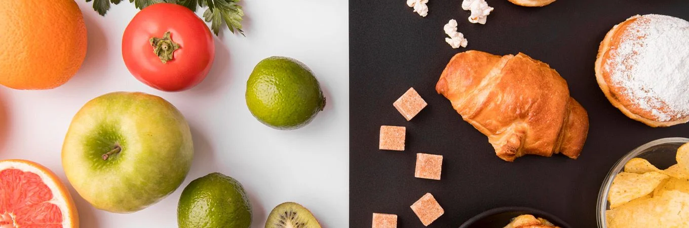 Eine lebendige Anordnung frischer Früchte links und verschiedene Backwaren und Snacks rechts