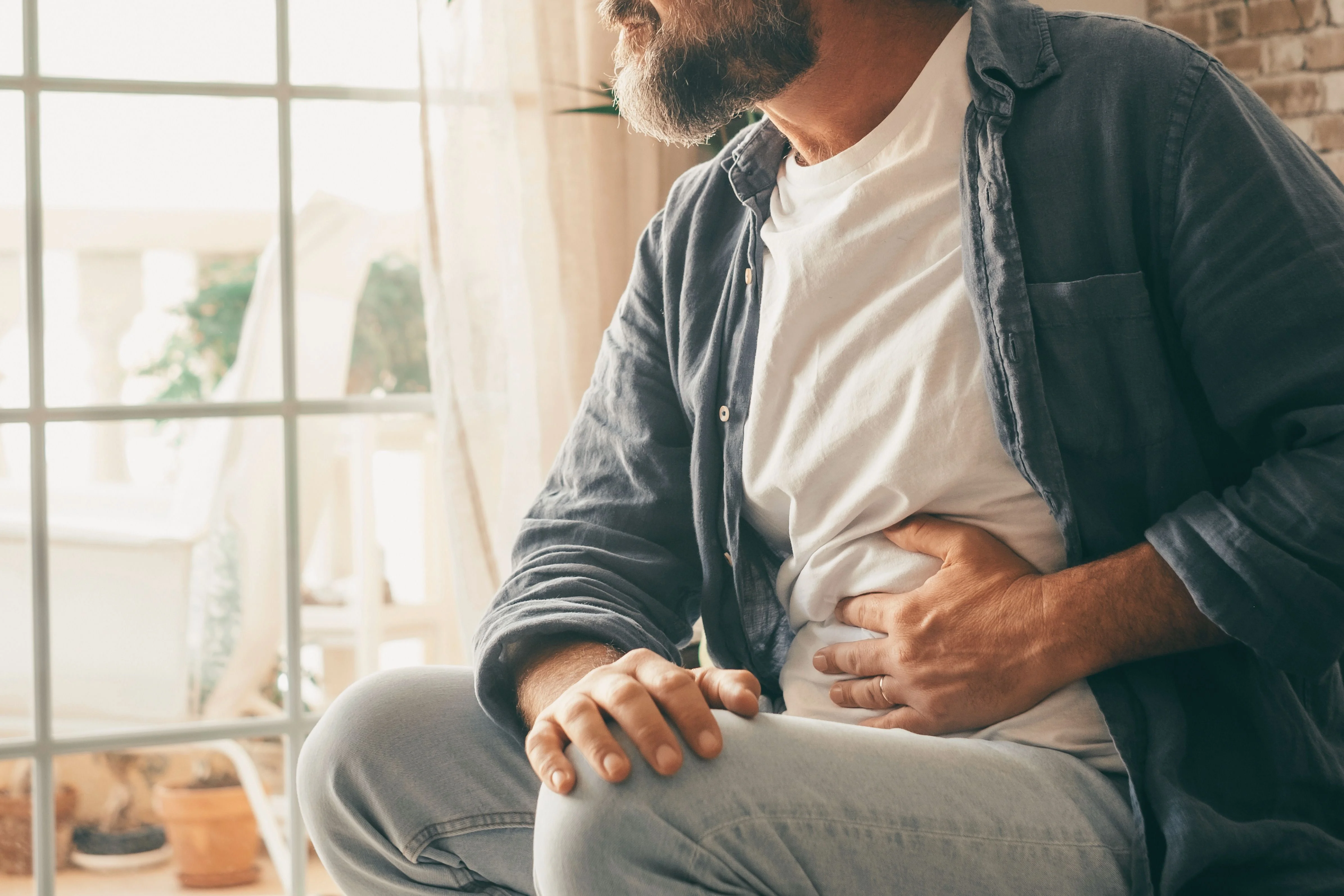 man with stomach pain